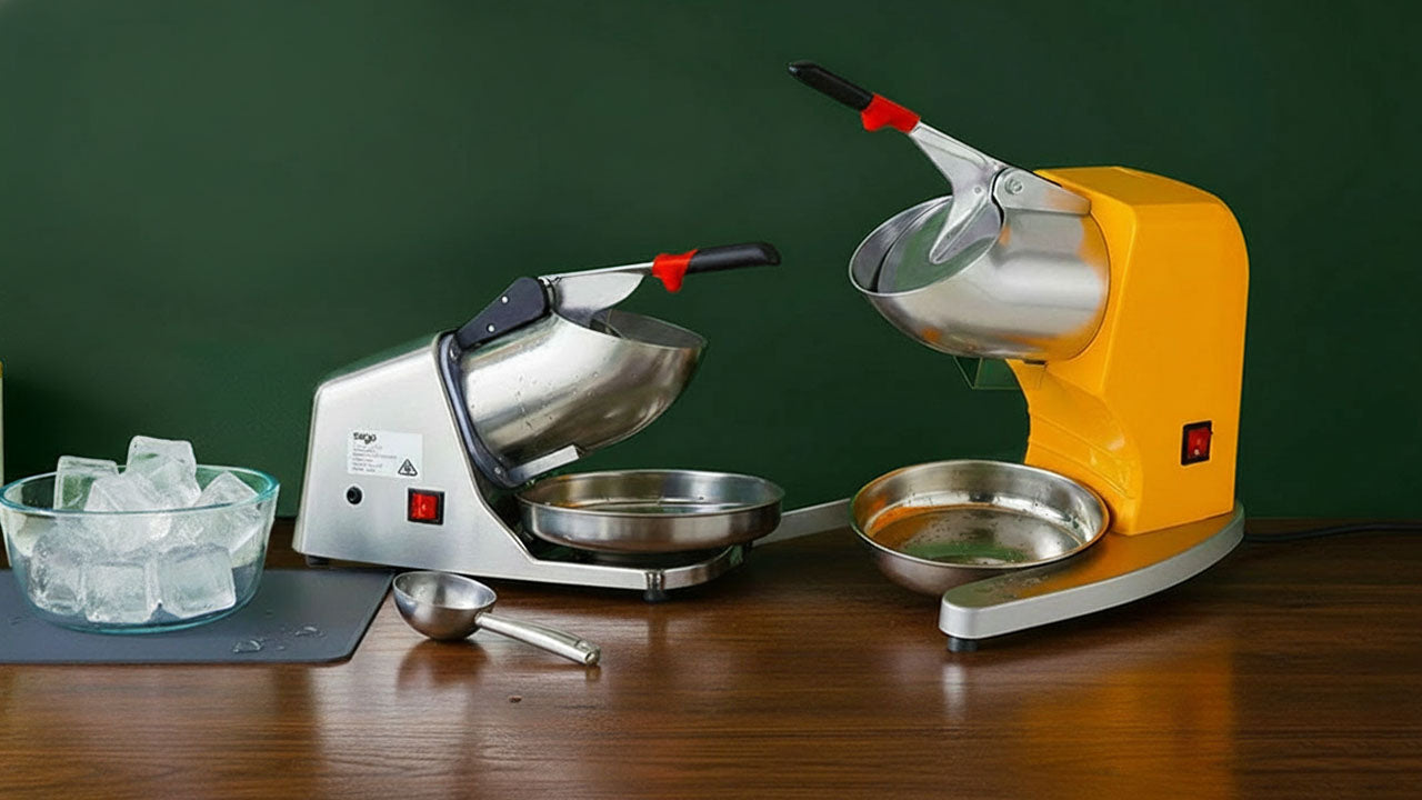 Two snow cone machines on a wooden surface with a green background